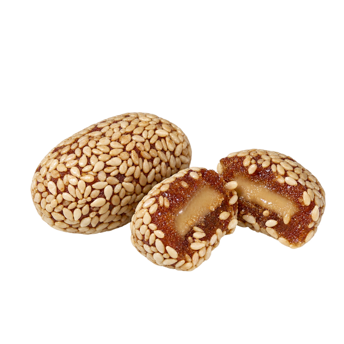 Whole and halved Palmaria Date Sesame Rolls showing the Tahini filling